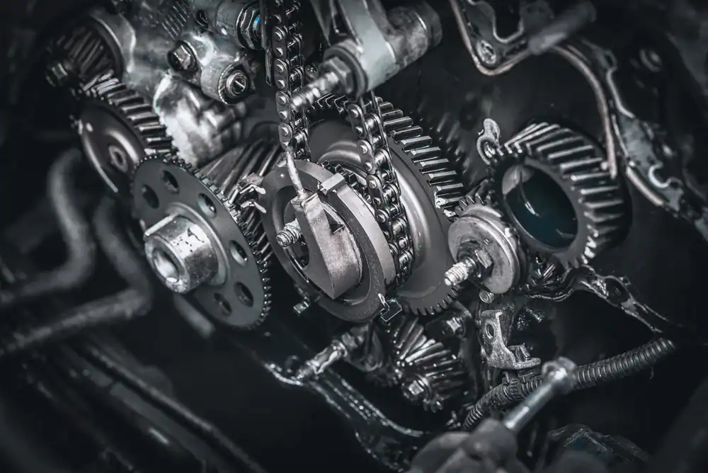 Close-up of engine gears showcasing intricate mechanical components, representing the precision and quality of transmission services offered by Pro Transmissions in Clarke County, Georgia
