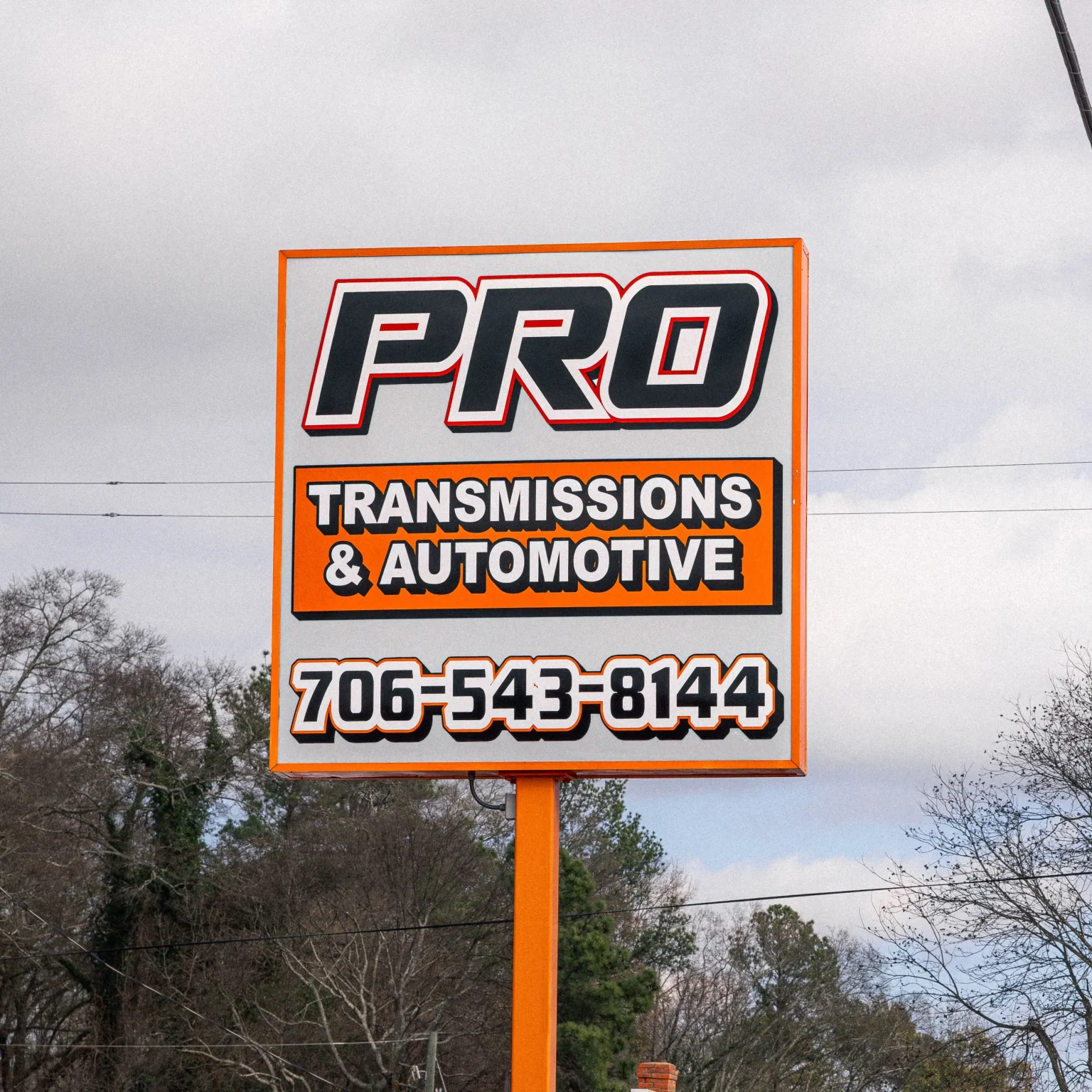 Pro Transmission & Automotive roadside sign.